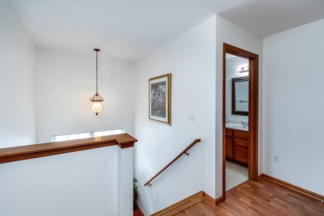 stairs with wood-type flooring