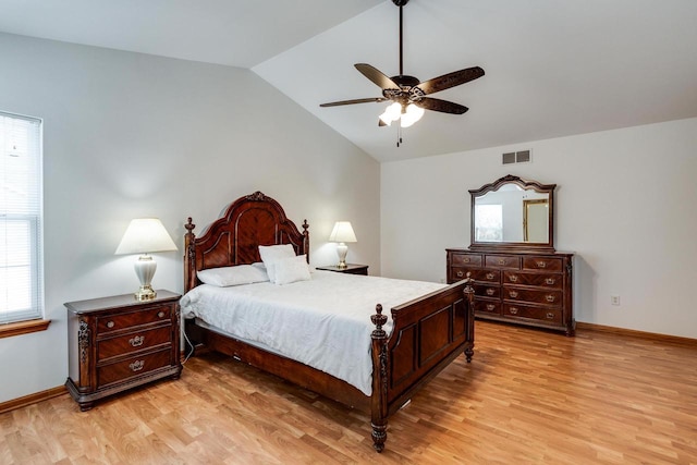 bedroom featuring vaulted ceiling, light hardwood / wood-style floors, and ceiling fan