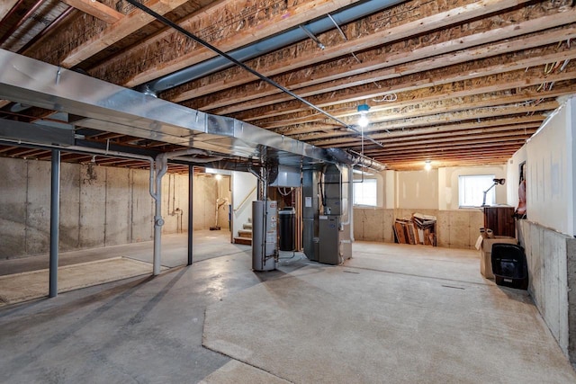 basement with heating unit and water heater