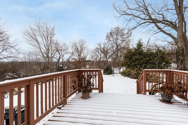 view of snow covered deck