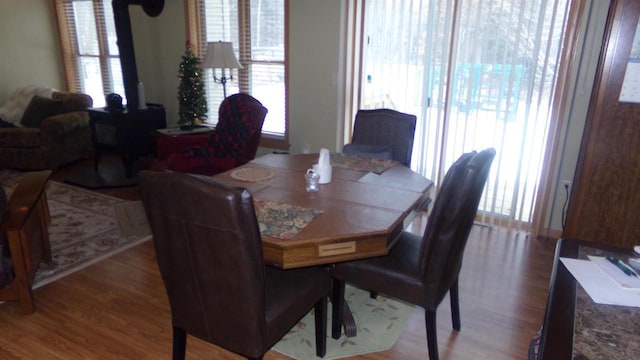 dining space with hardwood / wood-style floors and plenty of natural light