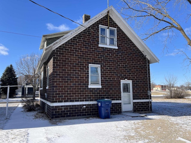 view of snow covered property