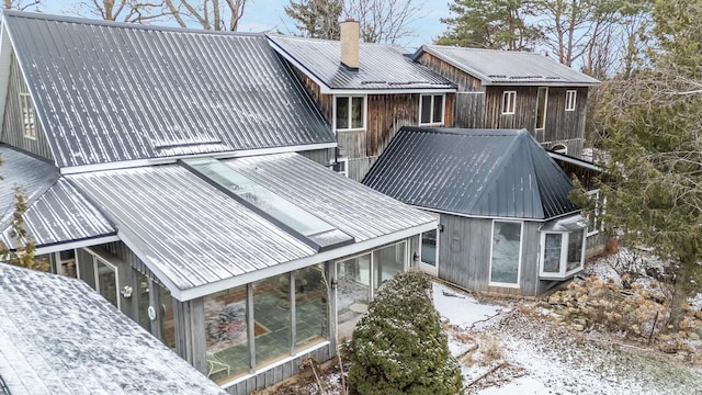 view of snow covered house