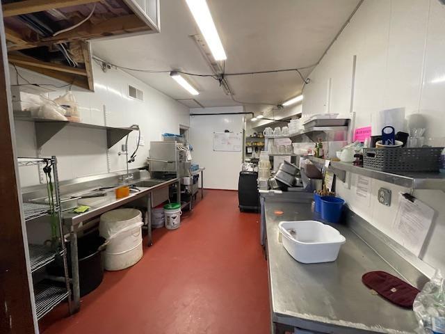 interior space featuring white cabinets