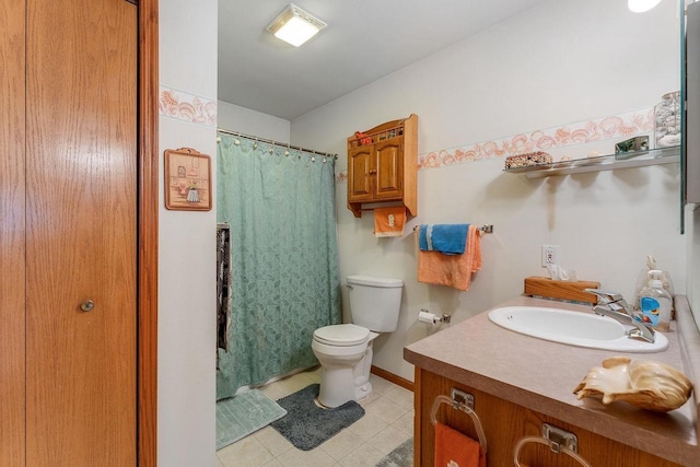 bathroom with toilet and vanity