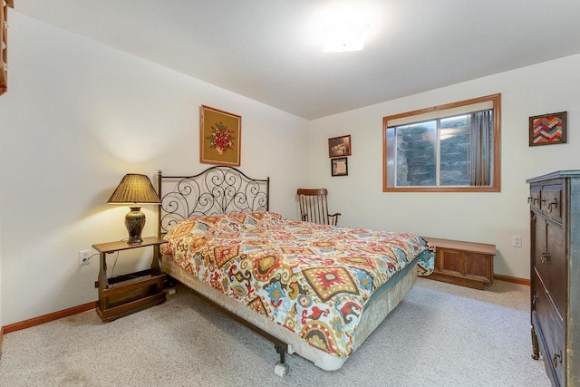 bedroom with light carpet