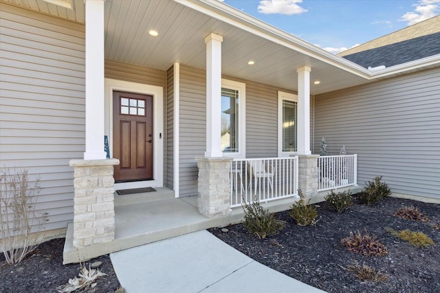 property entrance featuring a porch