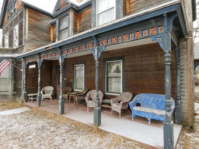 rear view of property featuring a patio area