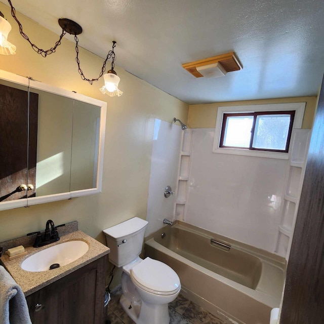 full bathroom featuring  shower combination, toilet, and vanity