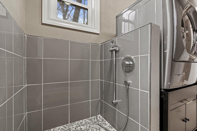 bathroom with tiled shower