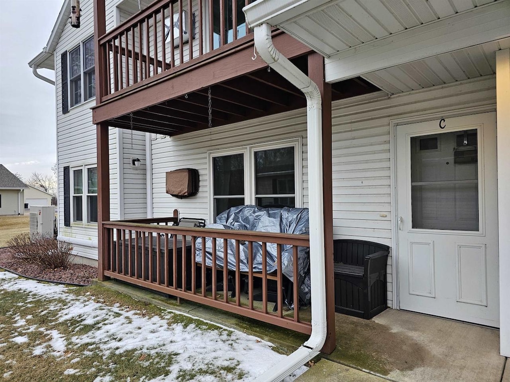 view of snow covered deck