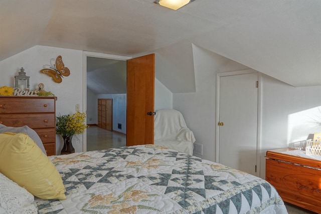 bedroom with vaulted ceiling