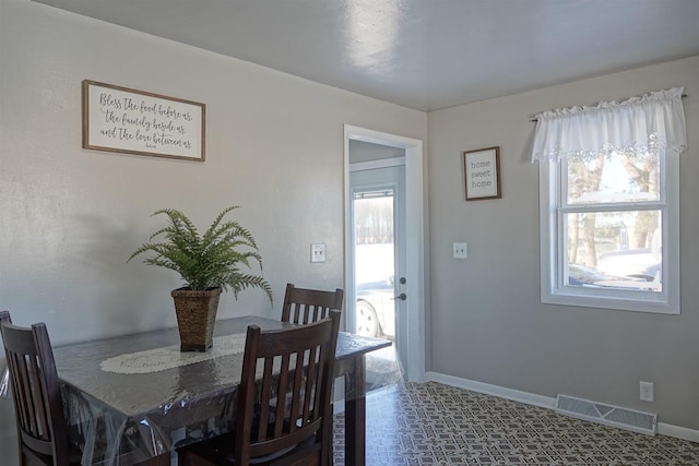 dining space with a wealth of natural light