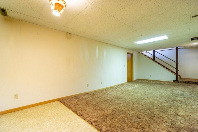 basement with a drop ceiling