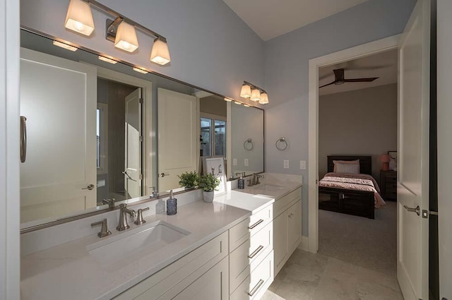 bathroom featuring ceiling fan and vanity