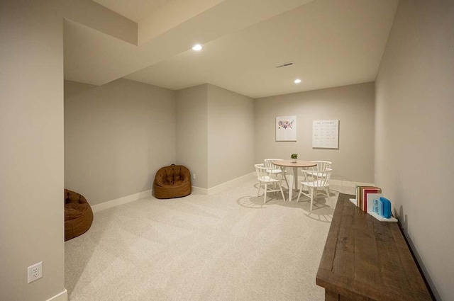 rec room with light carpet