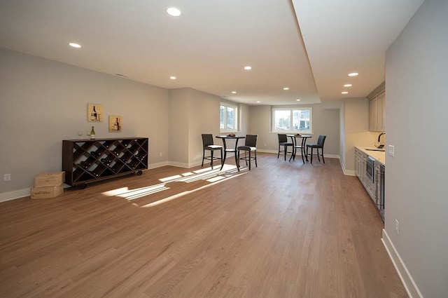 interior space featuring sink and light hardwood / wood-style floors