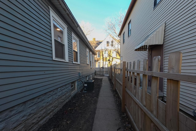 view of home's exterior with cooling unit