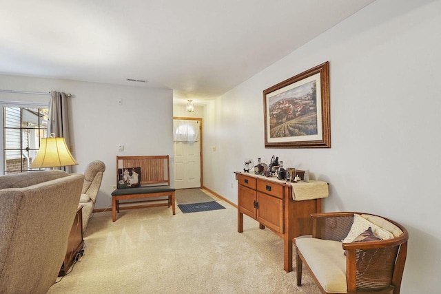 sitting room with light carpet