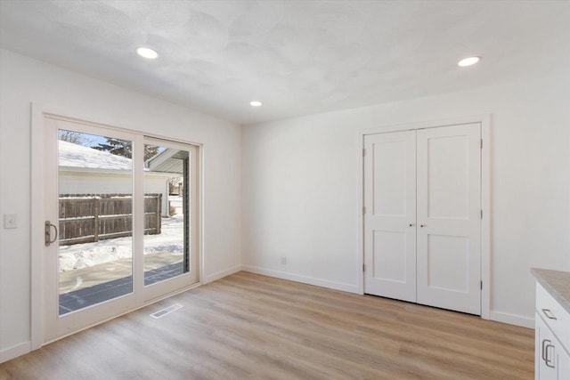 interior space with light hardwood / wood-style flooring