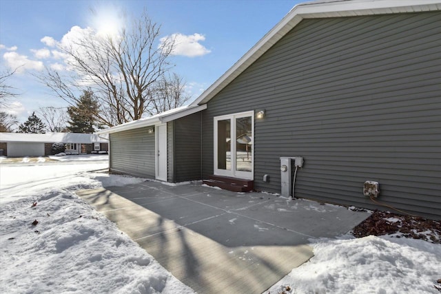 view of snow covered property