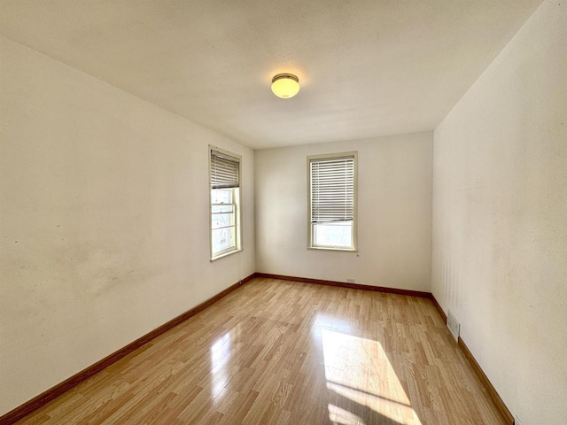 empty room featuring light hardwood / wood-style floors