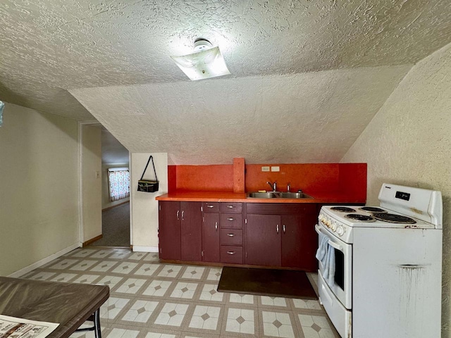 kitchen with vaulted ceiling, sink, and electric range