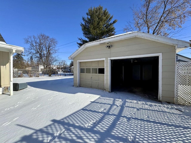 view of snow covered garage