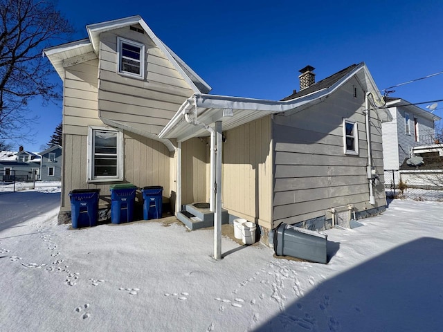 view of snow covered house