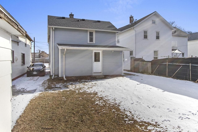 view of snow covered property