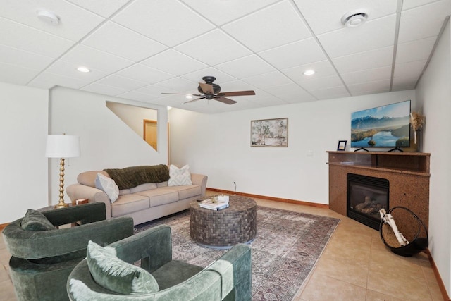 2743 Brooks Ridge Dr, Sun Prairie, WI 53590 - tiled living room featuring ceiling fan and a drop ceiling