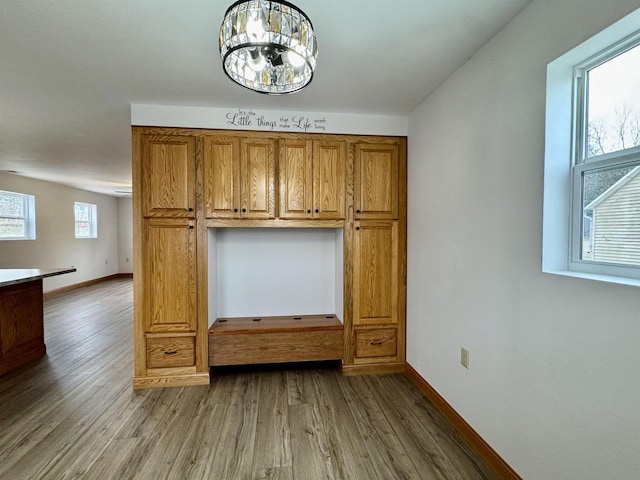 interior space with hardwood / wood-style floors and a chandelier