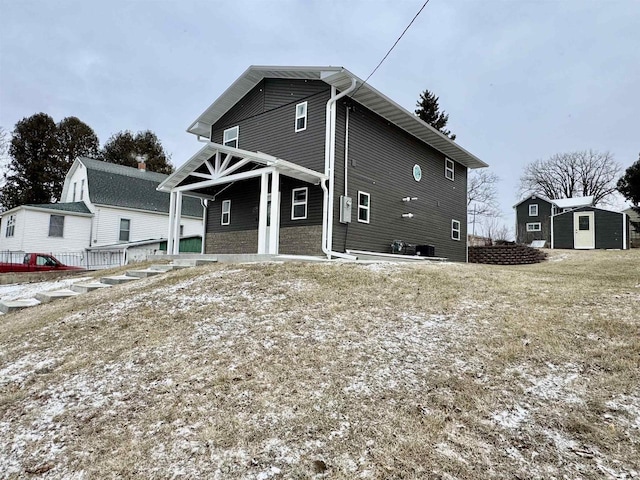 view of front of property with an outbuilding