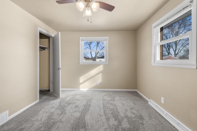 unfurnished bedroom with light carpet, a closet, and ceiling fan