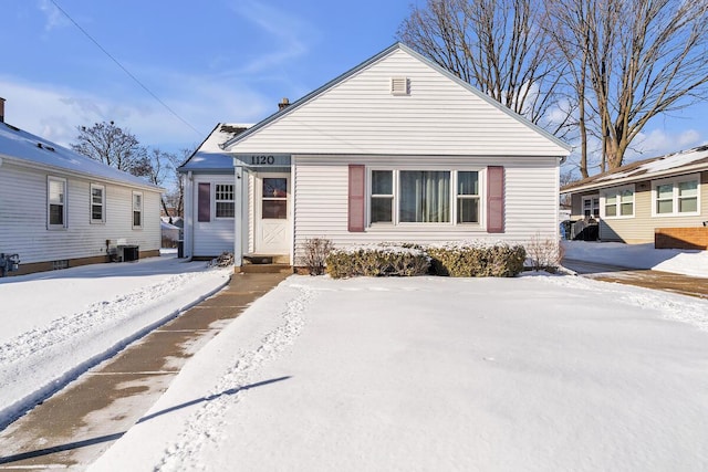 bungalow-style home featuring central air condition unit