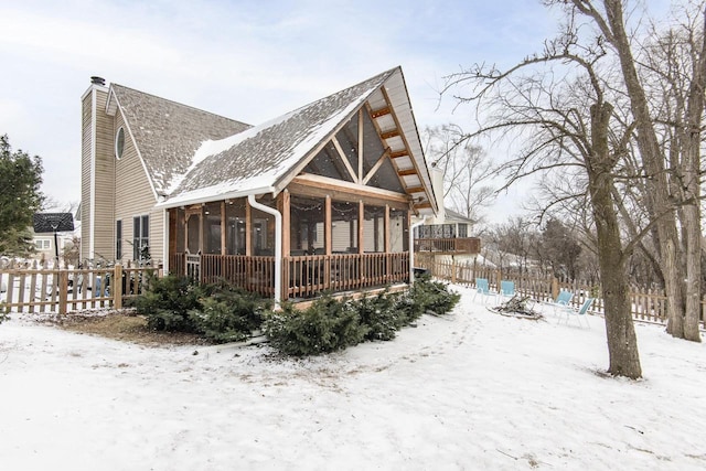 exterior space with a sunroom