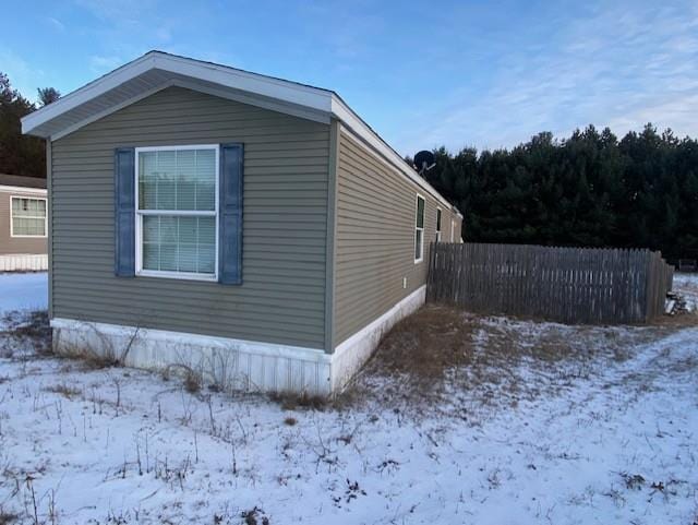 view of snow covered property