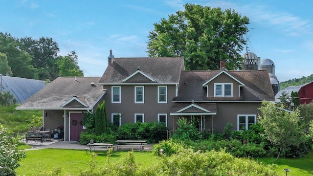 N3684 Claire Rd, Taylor, WI 54659 - view of front of house with a front yard and a patio