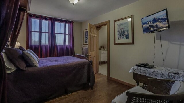 N3684 Claire Rd, Taylor, WI 54659 - bedroom featuring hardwood / wood-style floors