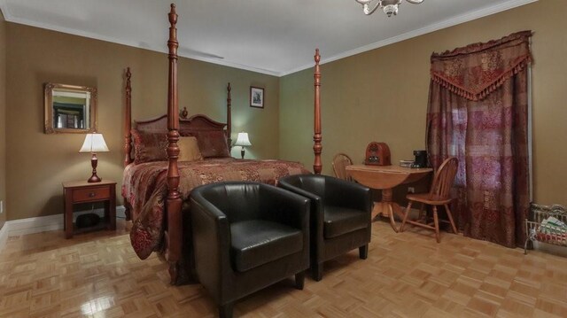N3684 Claire Rd, Taylor, WI 54659 - bedroom featuring crown molding and light parquet flooring