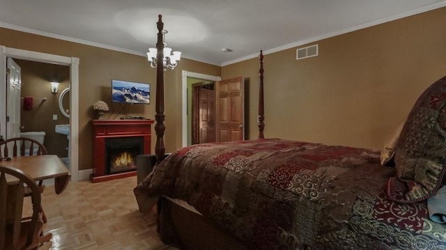 N3684 Claire Rd, Taylor, WI 54659 - bedroom with an inviting chandelier, ensuite bath, ornamental molding, and light parquet floors