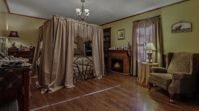 N3684 Claire Rd, Taylor, WI 54659 - living area featuring wood-type flooring, crown molding, and a chandelier