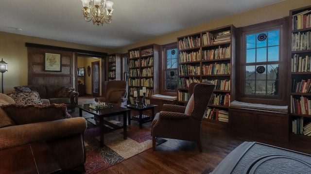 N3684 Claire Rd, Taylor, WI 54659 - sitting room with dark wood-type flooring and an inviting chandelier