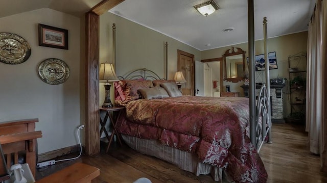 N3684 Claire Rd, Taylor, WI 54659 - bedroom featuring lofted ceiling and hardwood / wood-style floors
