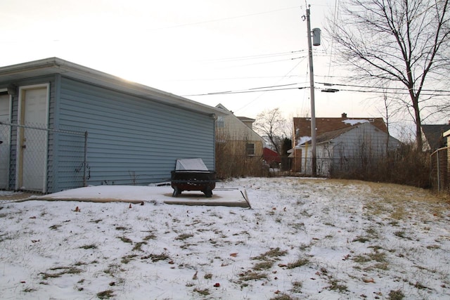 view of yard covered in snow