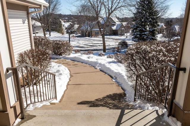 view of yard layered in snow