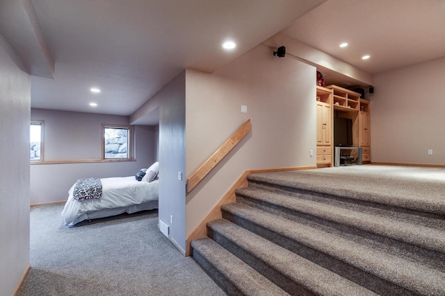 bedroom with carpet floors, baseboards, and recessed lighting