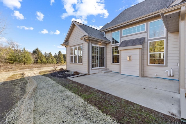 rear view of house with a patio