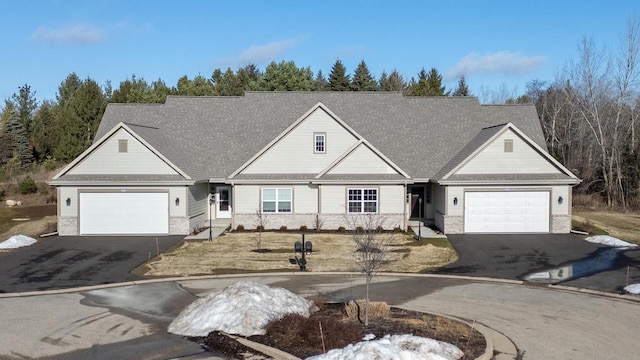 view of front of property with a garage