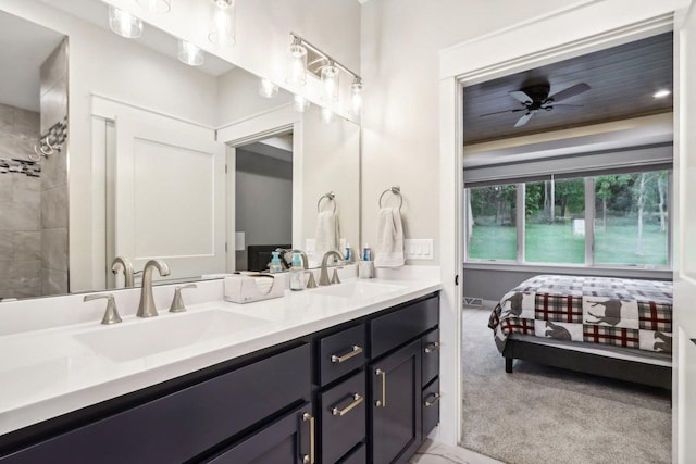 bathroom featuring vanity and ceiling fan